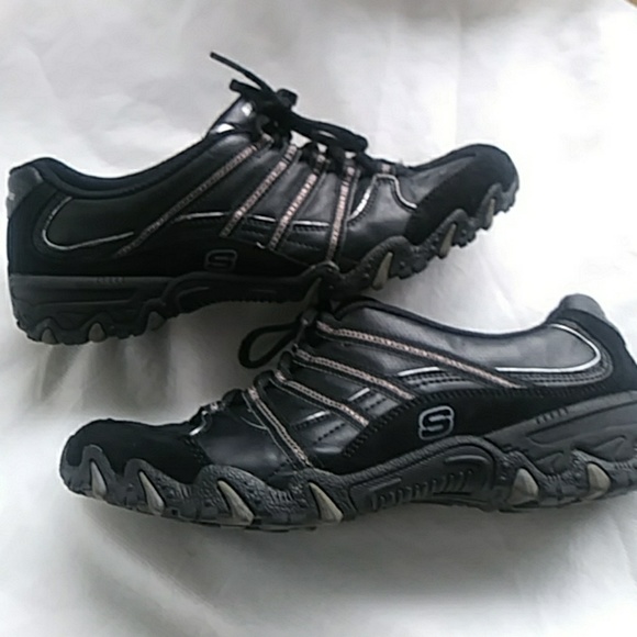solid black skechers
